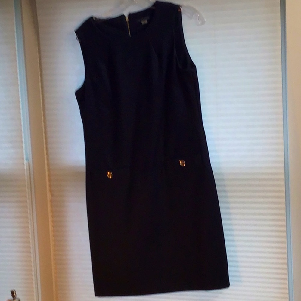 Navy jumper.